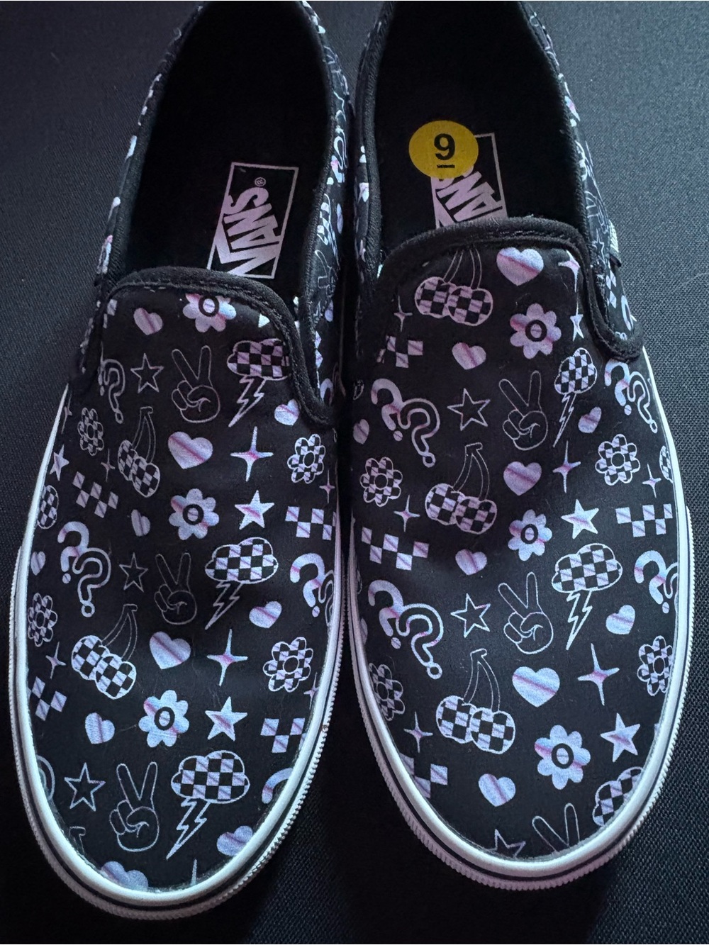 Vans women’s Size 9 Black Slip-On with Iridescent Holographic Icons NOT KIDS